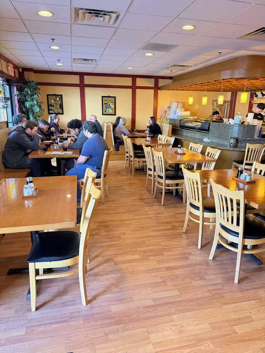 interior with wooden tables and dining guests at Sake House 2，a Japanese Restaurant in Jacksonville