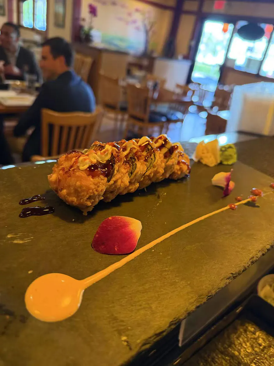 Fried sushi roll with sauces and rose petal at Sake House 2，a Japanese Restaurant in Jacksonville